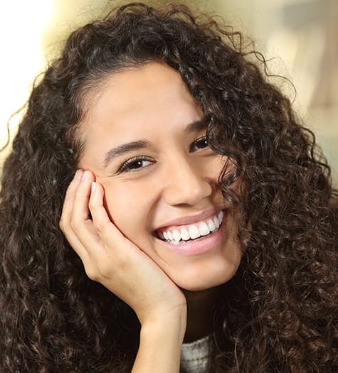 Teen girl sharing smile after teeth whitening