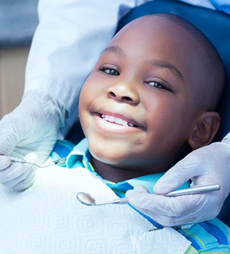 Toddler visiting Garland pediatric dentist for checkup