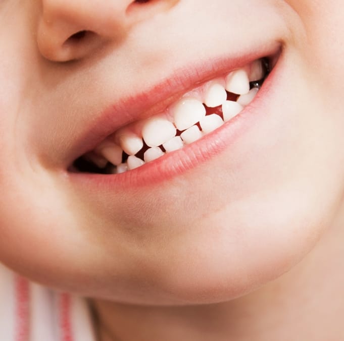 Close up of a child grinning