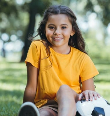 Little girl sharing smile after restorative dentistry