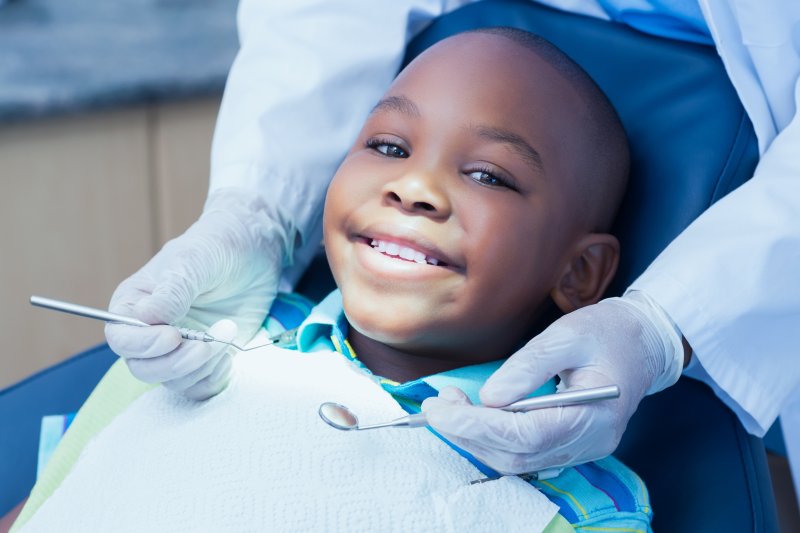 boy seeing pediatric dentist in Garland