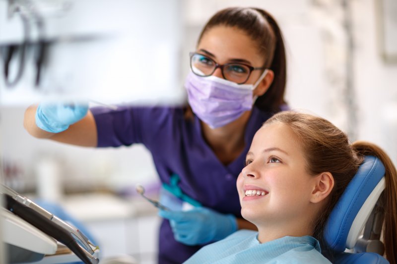 Child talking to a dentist