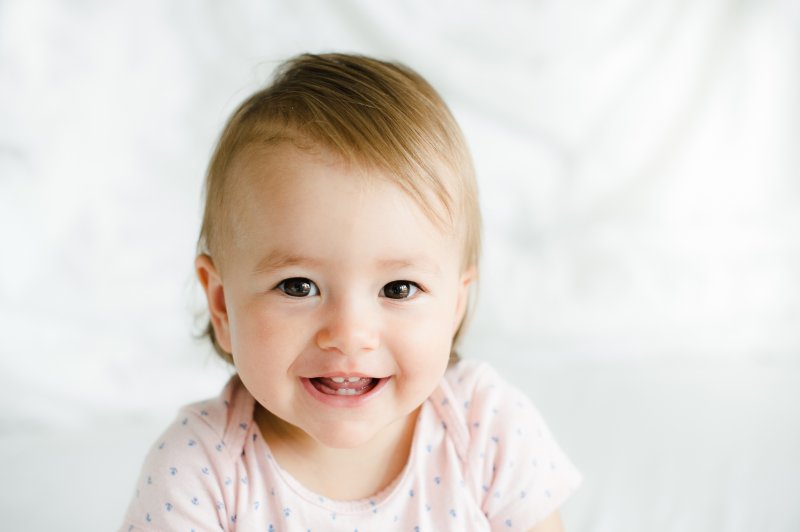 infant with primary teeth