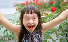 child with special needs smiling