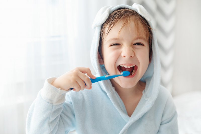 Child brushing their teeth