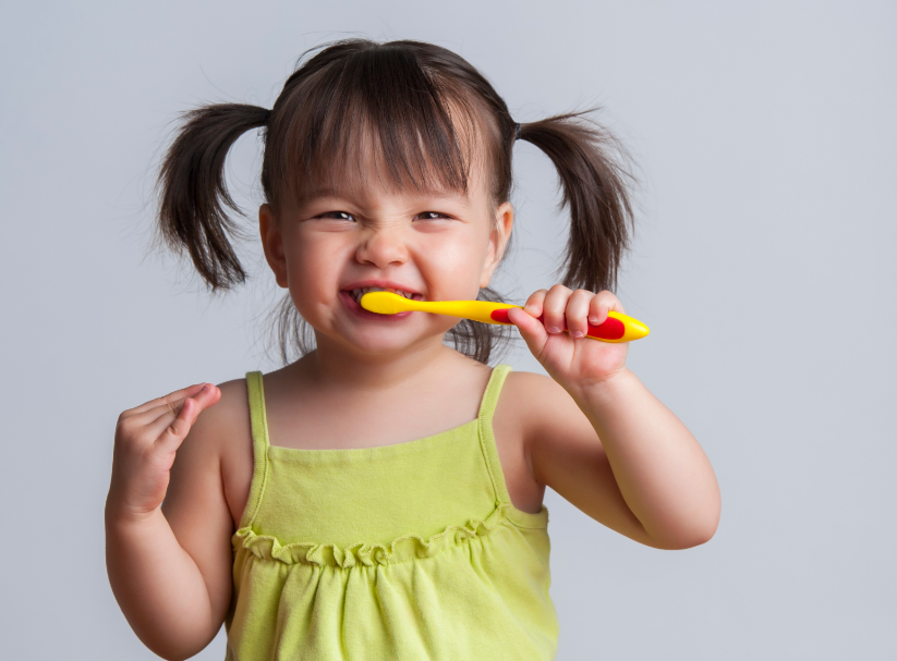 Toddler brushing teeth